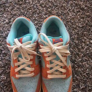 Orange and teal dunk low shoes